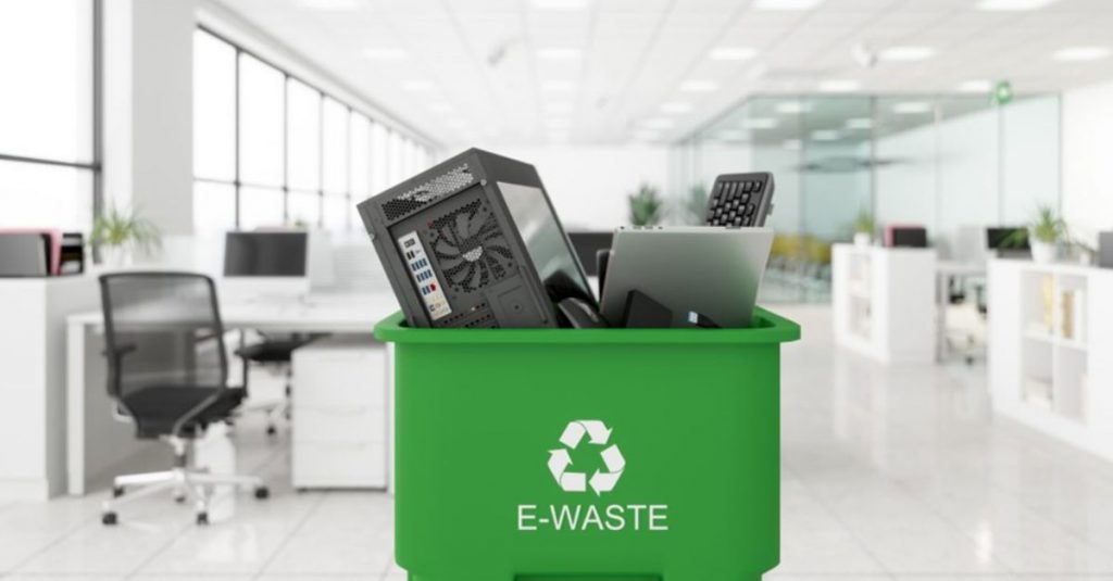 electronic waste on a green bin: e-waste